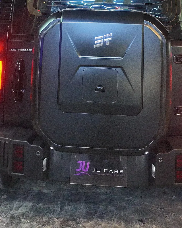 Rear of a matte Jetour T2 at night after clear matte PPF at JU Riyadh Center